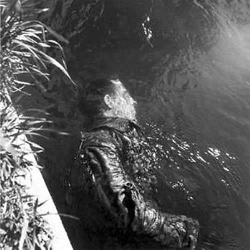 dead ss guard floating in canal lee miller