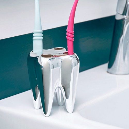 diente para guardar cepillos de dientes