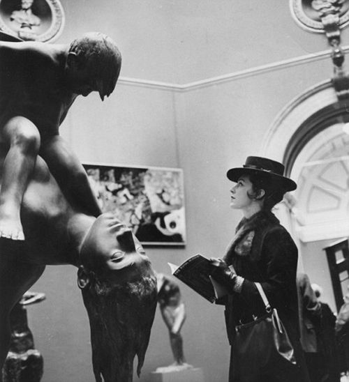 Mrs Valerie Davis standing in front of  a sculpture at the Royal Academy's Summer Exhibition in London.    (Photo by Evening Standard/Getty Images)