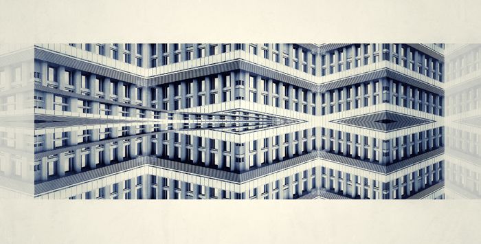 Edificio azulado simetria con formas geometricas arquiectura