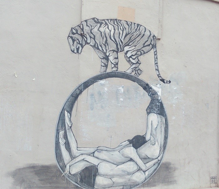 mural pintura artista calle tigre