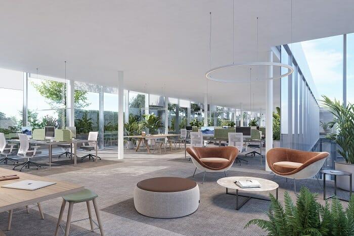 Diseño del interior de unas oficinas diáfanas con mesas y sillas