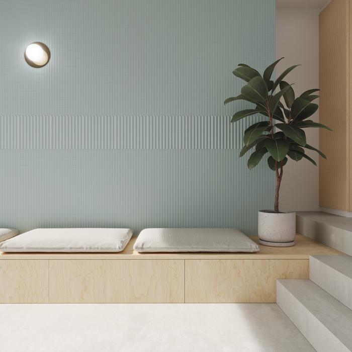 diseño de pared verde con zona de descanso cerámica sofá